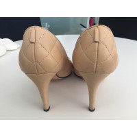 Chanel Pumps/Peeptoes en Cuir en Beige