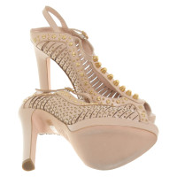 Alexander McQueen Pumps/Peeptoes en Cuir en Nude