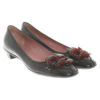 Miu Miu Slippers/Ballerina's Leer in Zwart