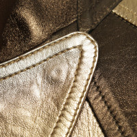 Gucci manteau de cuir couleur or