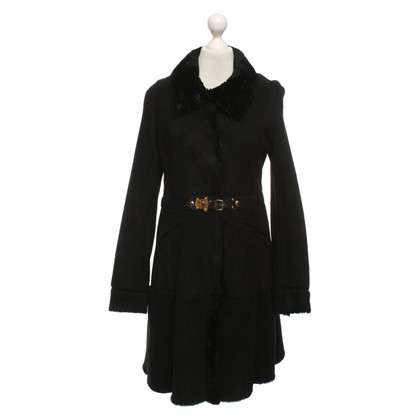 Miu Miu Jacke/Mantel aus Pelz in Schwarz