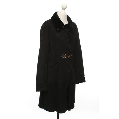 Miu Miu Jacke/Mantel aus Pelz in Schwarz
