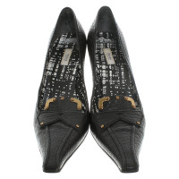 Prada Pumps/Peeptoes aus Leder in Schwarz