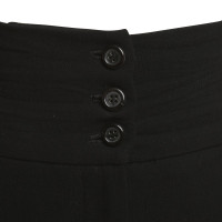 Yves Saint Laurent Pantaloni larghi in nero