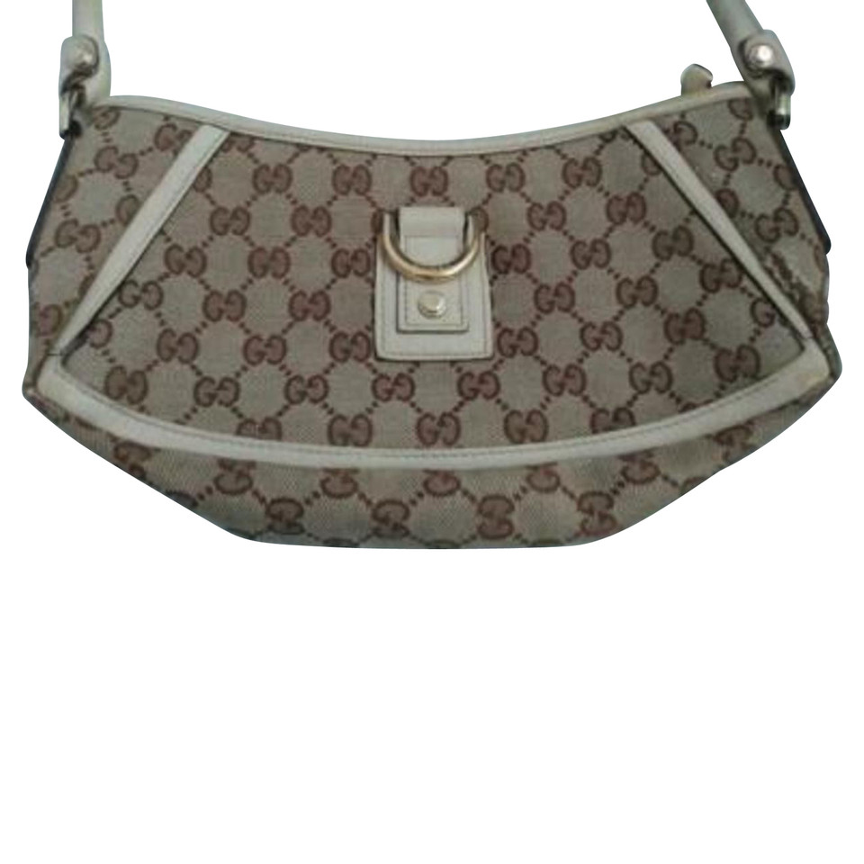 Gucci Clutch aus Canvas in Creme