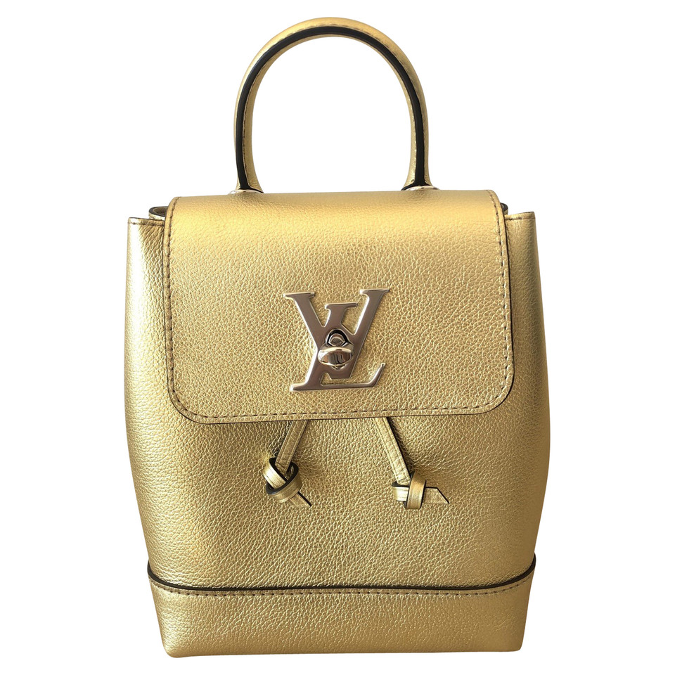 Louis Vuitton Rucksack aus Leder in Gold