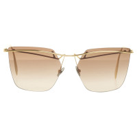 Alexander McQueen Sunglasses in Gold