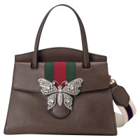 Gucci Handtasche aus Leder in Braun