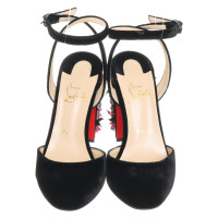 Christian Louboutin pumps with application