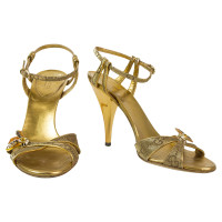 Gucci Sandalen aus Canvas in Gold