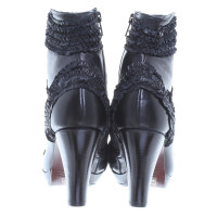 Chie Mihara Bottines en cuir avec volants