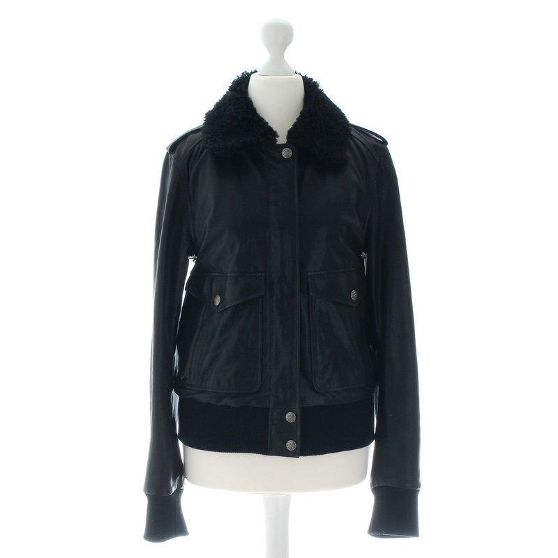 Alexander McQueen Leather jacket with fur collar