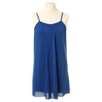 Alice + Olivia In blue dress with Ruffles