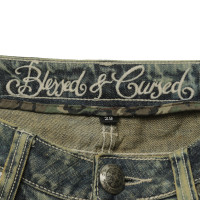 Blessed & Cursed Jeans mit Waschungen und Zierbesatz