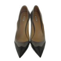 Miu Miu pumps con motivo a fori