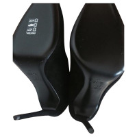 Giuseppe Zanotti pumps con open heel-regolabili