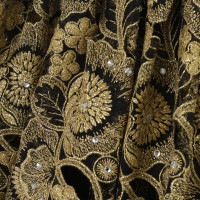 Andere merken Genny Oro - kant rok met gouden shimmer