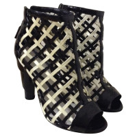 Chanel  Ankle boots in black and white