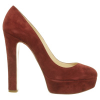 Christian Louboutin Peep toe pumps in red