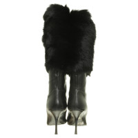 Gucci Leather boots with fur trim