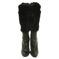 Gucci Leather boots with fur trim
