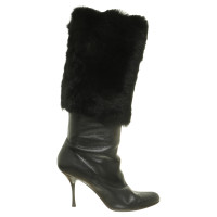 Gucci Leather boots with fur trim