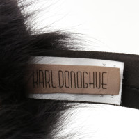 Karl Donoghue Karl Donoghue - oorwarmers gemaakt van lam bont