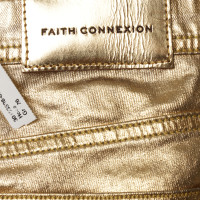 Faith Connexion Trousers in gold 