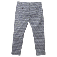 Closed Trousers with graphic patterns