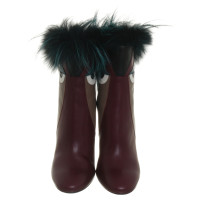 Fendi "Monster boots" with fur trim