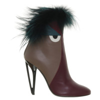 Fendi "Monster boots" with fur trim