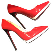 Christian Louboutin Pumps/Peeptoes Patent leather in Red