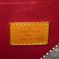 Louis Vuitton Croissant Canvas in Brown