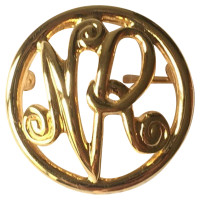 Nina Ricci Gold logo brooch