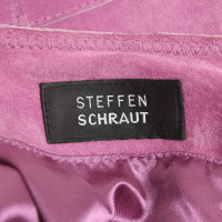 Steffen Schraut gonna di pelle in rosa