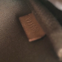 Louis Vuitton Pochette Mini Leather in Brown