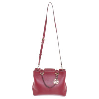 Michael Kors Bordeaux colored handbag