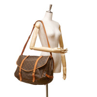 Louis Vuitton Saddle Bag in Tela in Marrone