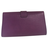 Yves Saint Laurent clutch in purple