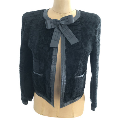 Chanel Jacke/Mantel aus Pelz in Schwarz