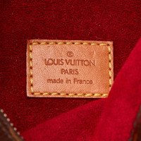 Louis Vuitton Croissant Canvas in Bruin