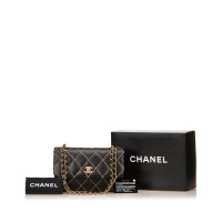 Chanel Surpique en Cuir en Noir