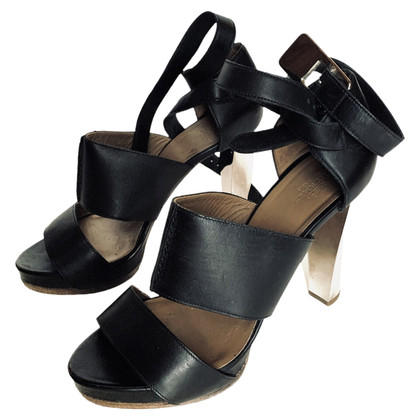 Hermès Sandalen aus Leder in Schwarz