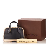 Louis Vuitton Dora PM aus Leder in Beige