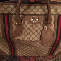 Gucci Valigia con tasche ed appendiabiti