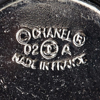 Chanel CC ronde clip op oorbellen