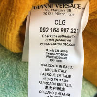 Versace Chaussons en jaune