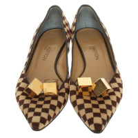 Louis Vuitton Pumps/Peeptoes Leather in Brown