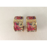 Carolina Herrera Gold colored earrings with pattern