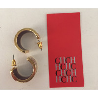 Carolina Herrera Gold colored earrings with pattern